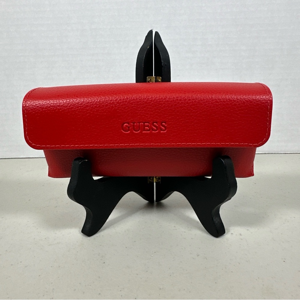 Guess Sunglasses Case. Red, Textured, magnetic closure with cleaning cloth.
